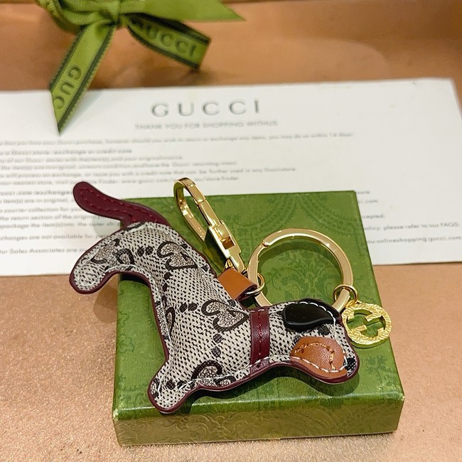 Gucci Dog-shaped bag charm 821812